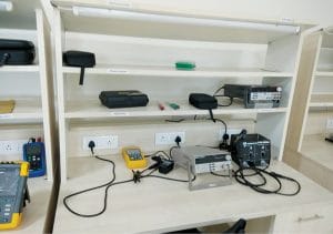 Electronics trainer kits at an incubator facility desk